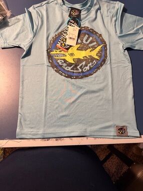 Maui and Sons Light Blue Tee with Yellow Shark Logo UPF 50+ swim shirt